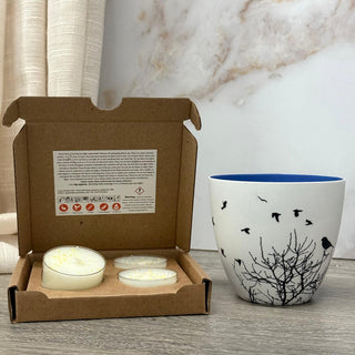pack of 4 tea lights with bird themed tea light holder