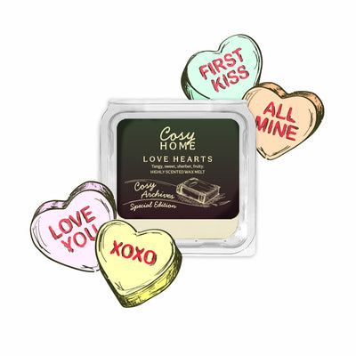 Cosy Home love heart-shaped wax melts with a clear container on a white background