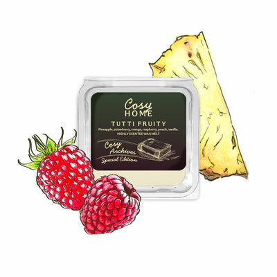 Cosy Home wax melt packaging with pineapple and raspberry illustrations on a white background